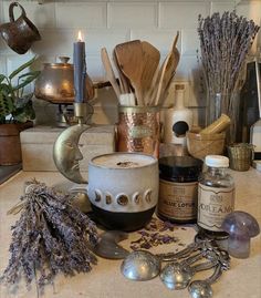 an assortment of kitchen utensils on a counter