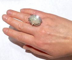 Very large beautiful ring crafted in solid white gold ! set with big solid Australian opal! the opal thick and well rounded. there is no cracks, no crazing, no damages to the opal! it produces many different fiery Neon colors as you rotate it under the light! in excellent condition with only very minimal wear to the gold! the ring well made! the band is thick! crafted in solid 14k white gold. it is vintage item - post ArtDeco. comes in a ring case and can be gifted immediately! please also see p White Ethiopian Opal Ring For Formal Occasions, Formal White Ethiopian Opal Ring, Oval Opal Ring With Polished Finish For Wedding, White Gold Opal Ring In Fine Jewelry Style, Elegant Silver Ethiopian Opal Ring, Formal Hallmarked Opal Ring, Anniversary White Gold Opal Cabochon Ring, Australian Opal Ring, Ring Case