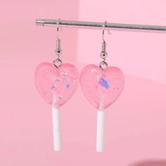 This Pair Of Star Lollipop Candy Kandi Sparkle Glitter Earrings Is A Wonderful Addition To Your Wardrobe And Your Style! This Unique Pair Is Sure To Get Lots Of Compliments ! Kawaii Style! Great For Valentine’s Day Or Anytime! Gshmvk0060008qw White Heart Drop Earrings For Party, Cute Heart Drop Earrings For Party, Trendy White Heart Earrings For Party, Heart-shaped Sweet Earrings For Party, Sweet White Heart Earrings For Valentine's Day, Sweet Heart-shaped Earrings For Party, Sweet White Heart Earrings, Sweet Heart-shaped Party Earrings, Cute White Heart Earrings For Party