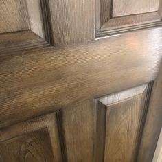 a close up view of a door with wood grains on the front and sides