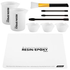 the resin / epoxy cleaning kit is shown in white and has black handles