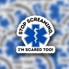 a blue and white sticker with the words stop screaming i'm scared too