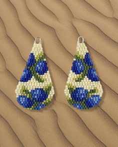 Beaded blueberries in a teardrop shape  Original design and fun for the summer solstice! Brickstitch and beaded with Miyuki Delicas (Japanese glass beads)  Finished and ready to ship! Brick Stitch Pattern Earring, Miyuki Beads Pattern, Earrings Native American, Brick Stitch Earrings, Brick Stitch Pattern, Bead Weaving Patterns, Handmade Earrings Beaded, Beaded Earrings Patterns, Beaded Crafts