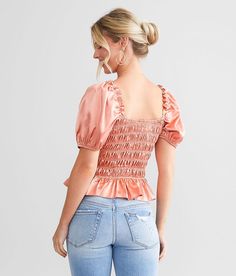 Willow & Root Smocked Satin Top - Pink X-Small, Women's Rosegold Elasticized square neck ruffled crop top Puff sleeves Bust measures 27 on size small Body length 19 on size small. 97% Polyester 3% Spandex. Hand wash cold. Line dry. Do not bleach. Iron low heat.. Measurements: Bust -Fullest part of bust with arms at sides. Waist -Circumference of natural waist: above belly button below rib cage. Hips -Standing with feet together fullest part of hips. WOMEN'S TOP SIZE CONVERSION CHART Size US/CAN Ruffled Crop Top, Conversion Chart, Satin Top, Waist Circumference, Top For Women, Women Shirts Blouse, Neck Ruffle, Rib Cage, Shirts Blouses