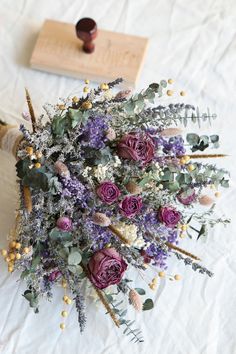 a bouquet of flowers sitting on top of a table