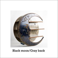 the moon shelf is made out of metal and wood, with two shelves on each side