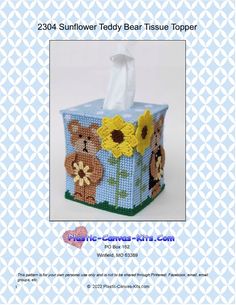 a tissue box with flowers and teddy bears on it, in the shape of a shopping bag