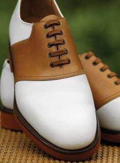 The Cannock Saddle Shoe in White & Tan White Goodyear Welted Plain Toe Dress Shoes, White Goodyear Welted Dress Shoes For Business, Classic Golf Shoes With Rubber Sole, White Oxfords With Contrast Sole For Formal Events, White Oxfords With Contrast Sole For Formal Occasions, Classic White Golf Shoes With Leather Sole, Classic Golf Shoes With Leather Sole And Round Toe, White Goodyear Welted Dress Shoes With Round Toe, Formal White Golf Shoes With Leather Sole