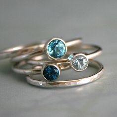 pretty Elegant Stackable Blue Topaz Ring, Blue Stackable Rings With Accent Stones, Blue Sapphire Stackable Gemstone Rings, Blue Sapphire Stackable Rings With Gemstones, Elegant Blue Sterling Silver Stackable Rings, Blue Fine Jewelry Stackable Rings With Bezel Setting, Fine Jewelry Blue Topaz Gemstone Stackable Rings, Blue Gemstone Stackable Rings In Sterling Silver, Blue Stackable Rings With Accent Stones As Gift