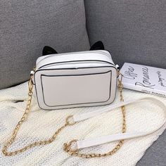 #SS0520 Material: PU Color: black, white Size: 19cm*12cm*7cm Shoulder strap length: 120cm Shipping: Free Shipping Worldwide for order over 15$, 7-15 days delivery to US/UK/CA/AU/FR/DE/IT and most Asia Countries Trendy White Phone Bag With Zipper, Trendy White Phone Bag With Zipper Closure, Trendy White Phone Bag With Adjustable Strap, White Rectangular Phone Bag With Zipper, Trendy White Rectangular Phone Bag, White Rectangular Shoulder Bag With Cat Design, White Casual Bags As Fashion Accessory, Trendy White Bag With Cat Design, White Cat Design Shoulder Bag