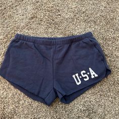 Usa Shorts Never Worn, Size Xs With Pockets Summer Cotton Bottoms With Letter Print, Blue Bottoms With Letter Print, Short Length, Blue Cotton Athletic Shorts For Summer, Casual Blue Shorts With Letter Print, Blue Letter Print Short Bottoms, Blue Short Bottoms With Letter Print, Casual Pajama Shorts With Letter Print, Casual Cotton Pajama Shorts With Letter Print, Casual Letter Print Pajama Shorts