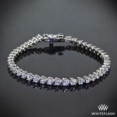 A delicate display of pure brilliance, diamonds are set in a flexible three prong Tennis Bracelet. Dolphin Jewelry, Handcrafted Silver Jewelry, Silver Jewellery Online, Chic Bracelet, Buy Earrings, Diamond Tennis Bracelet, Radiant Diamond, Buying Diamonds, My Favourite Things