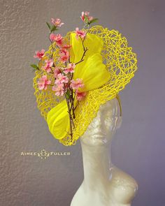 Structured, chic crisscross woven material on this asymmetrical showpiece. Silk ribbon feature and pretty cascading cherry blossoms.   Easy-to-wear headband fascinator makes a statement, and can be worn to a myriad of events: Easter, Bridal, Derby-Wear, Del Mar Races, Hat Contests, Church, Gala, Kentucky Derby, Melbourne Cup, High Tea, Weddings, Cocktail Parties, Weddings, and More.  Some customization available; please message with your requests to see if we can meet your needs. Other colors available; please inquire before purchase if you need another.  *FREE SHIPPING  For more STATEMENT JEWELRY and HANDMADE HATS go to www.aimeesfuller.com Aimee Fuller has been a trusted online seller since 1999, and is excited to bring her creations back to Etsy.  Though often copied by hobbyists and ev Spring Yellow Fascinator Hat, Yellow Evening Headpieces For Spring, Yellow Spring Fascinator, Spring Evening Yellow Headpieces, Yellow Hat Fascinator For Garden Party, Yellow Fascinator Hat For Garden Party, Yellow Fascinator For Garden Party, Yellow Summer Fascinator With Short Brim, Spring Yellow Fascinator With Curved Brim