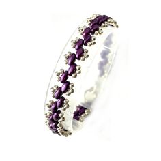 a purple and white bracelet with beads on it