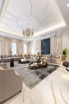 a living room filled with furniture and a chandelier