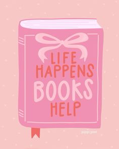 a pink book with the words life happens books help written on it and a bow