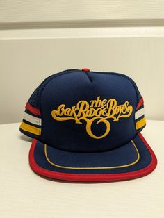 Retro Fitted Hat For Baseball Season, Retro Adjustable Fitted Hat For Baseball Season, Retro Snapback Fitted Hat For Streetwear, Retro Flat Bill Baseball Cap For Streetwear, Retro Adjustable Snapback Hat For Sports, Retro Trucker Hat For Baseball Season Streetwear, Retro Flat Bill Trucker Hat For Streetwear, Retro Flat Brim Trucker Hat For Baseball Season, Retro Snapback Hat For Streetwear