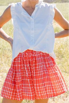 The perfect Americana shorts are here, to wear to EVERY Holiday this Spring/Summer! - Flowy short that feature a ruffle detail at the side and a red and white check print through out with a tie waist - Fit true to size - Model is in a size Medium - Fabric: 100% Polyester - Paired with our Lake Daze Crop Tee * due to screens and filters colors may vary slightly to photos * Flowy Tiered Skirt With Built-in Shorts, Flowy Bottoms With Built-in Shorts For Day Out, Short Flowy Skirt With Built-in Shorts, Red Summer Skort With Built-in Shorts, Playful Red Cotton Shorts, 90s Sports, Flowy Shorts, Sporty And Rich, Western Chic