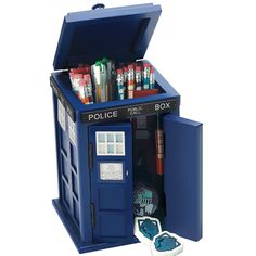 a blue police box with toothbrushes and other items in it