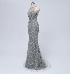 Fitted Sleeveless Mermaid Dress For Pageant, Fitted Sleeveless Evening Dress For Pageant, Sleeveless Embellished Mermaid Wedding Dress, Silver Sleeveless Evening Dress With Sweep Train, Silver Sleeveless Dress With Sweep Train, Sleeveless Silver Dress With Sweep Train, Embellished Sleeveless Mermaid Dress For Prom, Future Punk, Beaded Mermaid