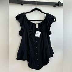 New With Tags -Nwt Never Worn Casual Top, Cotton, Color Black Can Be Worn Off The Shoulder Or As A T Shirt Or Tank Very Cute With Jeans Casual Black Tank Top With Button Closure, Chic Button-up Cotton Tank Top, Chic Cotton Button-up Tank Top, Black Button-up Top With Ruffles, Black Casual Buttoned Tank Top, Casual Black Buttoned Tank Top, Everyday Ruffled Tops, Black Summer Tank Top With Button Closure, Black Button Closure Tank Top For Summer