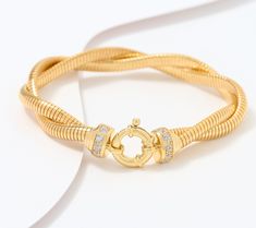 The twisted design of this tubogas double-strand bracelet exudes fine craftsmanship and trend knowledge that won't go unnoticed. Couple with your coolest, low-key-luxe outfits or a date-night dress. Adjustable Yellow Gold Bracelet With Rectangular Links, Chic Gold-tone Bracelet With Rectangular Links, Yellow Gold Tarnish-resistant Bracelet With Rectangular Links, Elegant 14k Gold-filled Bracelet With Rectangular Links, Adjustable Gold-tone Chain Bracelet With Rectangular Links, Twisted Bracelet, Strand Bracelet, Date Night Dresses, Low Key