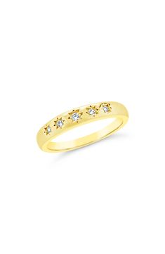 Stack your fingers and make a statement with this gleaming golden ring that is encrusted with sparkling stars. 14K gold plated brass/cubic zirconia stones Store in an air-tight bag when not wearing. Do NOT expose to any harsh chemicals, jewelry cleaners, or perfume. Imported Gold Star-shaped 14k Diamond Ring, Gold Cubic Zirconia Diamond Ring With Sparkling Detail, Celestial Gold Diamond Ring With Vs Clarity, Gold Star-shaped Diamond Ring, Gold Cubic Zirconia Sparkling Rings, Gold Sparkling Rings For Promise, Gold Sparkling Cubic Zirconia Rings, Sparkling Gold Cubic Zirconia Rings, Yellow Gold Rings With Sparkling Stones For Promise