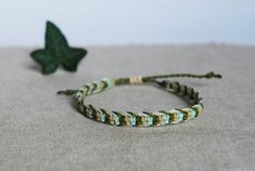 This listing is for one cord bracelet, handmade by macramé, in army green, mint and beige. Perfect jewel for him or for her, comfortable, resistant, to add a boho, surf, modern touch to your outfit! You will recive this bracelet in a beautiful gift packaging ♥ - - - - - - - - - - - - - - - - - - - ▼ Width: approx 6 mm (0.2 inches) ▼ The bracelet has a sliding knot to adjust the length to the size you need. ▼ Made of high quality waxed thread, water and time resistant, doesn't spot nor bleed.  It Casual Green Friendship Bracelets With Adjustable Cord, Casual Green Friendship Bracelet With Adjustable Cord, Green Adjustable Cord Friendship Bracelet, Green Friendship Bracelets With Sliding Knot For Everyday, Green Sliding Knot Friendship Bracelets, Everyday Green Friendship Bracelets With Sliding Knot, Green Bohemian Braided Bracelets For Everyday, Casual Green Braided Bracelets For Everyday, Green Sliding Knot Friendship Bracelet