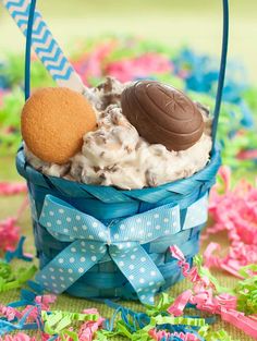 an ice cream sundae in a blue basket