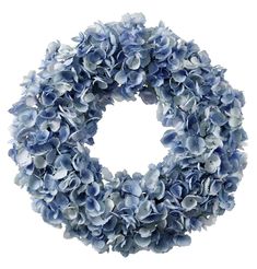 a wreath with blue flowers is shown on a white background