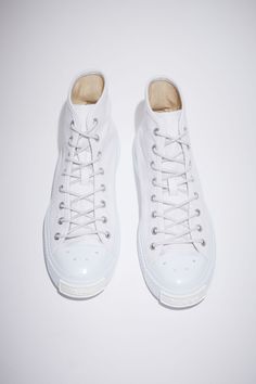 Acne Studios optic white high top sneakers are made from cotton with rubber soles. Completed with a branded logo tag on the front. Ballow High Tag M Men's Shoes Accessories, White High Tops, Women's Shoes Accessories, Jeans Bag, Logo Tag, Mini Shoulder Bag, Cotton Style, White Sneaker, High Top