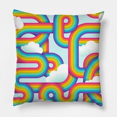 a colorful pillow with clouds and rainbows in the sky on top of each other