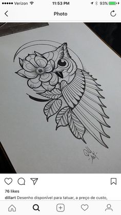 an owl with flowers on it's head sitting on top of a piece of paper