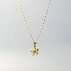 With arms spread wide, it shines so bright. A gold starfish charm necklace, in your sight.  This 14K gold Starfish Pendant features a three-dimensional representation of a starfish, with its arms spread out to create a realistic and detailed look. The intricate patterns on the starfish's surface add texture and depth to this gold starfish necklace. Let your spirit shine with this beautiful and unique nautical pendant. Showcase your love for the seas with sea life jewelry such as this starfish pe Elegant Gold Charm Necklace With Starfish, Gold Starfish Charm Jewelry, Gold Starfish Charm Necklace Gift, Yellow Gold Star Necklaces With Starfish Charm, Gold Necklace With Starfish Charm For Gift, Gold Nautical Jewelry With Star Charm, Gold Starfish Necklace With Lobster Clasp, Ocean-inspired Gold Jewelry With Star Charm, Gold Charm Necklaces With Starfish Charm As A Gift