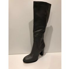 New Sam Edelman Regina Leather Knee High Boots. Retail $170.00. Size: 9m. Color: Charcoal Grey. Heel Height: 4". Leather Upper. Side Zipper Closure. Elastic Inserts At Top Of Shaft. Textile Lining. Synthetic Sole. Shaft Height, 19.5", Calf Circumference: 16.5". Condition: New Never Worn Shoes With Minor Scratches/Light Stains On Outsoles. Box Not Included. Office Almond Toe Leather Heeled Boots, Chic Closed Toe Boots With Leather Lining, Winter Leather Heels For Office, Closed Toe Leather Lined Boots For Office, Designer Closed Toe Boots With Leather Lining, Fall Calf Leather Heeled Boots With Closed Toe, Leather Heeled Boots With Leather Lining For Office, Formal Heeled Boots With Stacked Heel And Round Toe, Leather Heels For Work In Winter