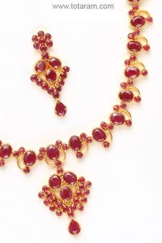 Rubies Necklace & Long Earrings Set in 22 Karat Gold.
  Gross Gold Weight of Necklace Set: 36.000 grams
  Total Weight of Rubies: 30.00 Carats
  
    Note: We can make this same design with Emeralds, Blue Sapphire 
  or in any other colored stone of your choice for the same price. - 235-SET278 - in 36.000 Grams for USD $3544.99. 
Made in India by Totaram Jewelers Online this product is in Gold - 22 Karat BIS Hallmark 916 KDM Gold  & is an excellent gift for Adult - Women. Ships fully Emerald Haram, Rubies Necklace, Ruby Necklace Designs, Gold Ruby Necklace, Traditional Jewellery, Ruby Emerald, Red Necklace, Colored Stone, Ruby Necklace