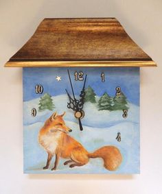 a clock with a painting of a fox on it