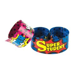 two bracelets with the words super student printed on them, one in pink and one in blue