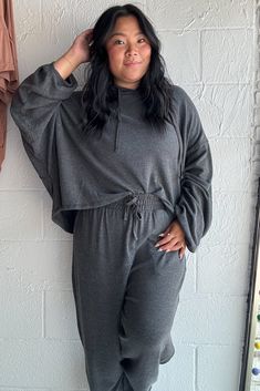 This charcoal grey ultra soft cropped hoodie + joggers set is here to keep you cozy and stylish! Its ultra-soft fabric will make you feel like you're living in a cloud, so you can feel great and look great. What more could you want?! Dani is wearing size 2X for an oversized fit Comfortable Gray Sweats For Loungewear, Comfy Gray Hoodie For Loungewear, Gray Sweats For Fall Loungewear, Comfy Hooded Loungewear Activewear, Cozy Fit Gray Hoodie For Loungewear, Comfy Hooded Activewear For Loungewear, Comfortable Gray Hoodie For Loungewear, Gray Hoodie Activewear For Loungewear, Comfy Activewear With Drawstring Hood For Loungewear