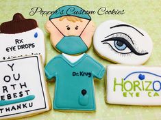 cookies decorated to look like doctors and eye doctor's shirts with the words dr kryg on them