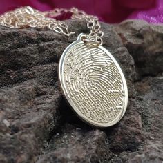 "Free first class shipping on all items with standard gift box! Free priority shipping on orders over $140 with upgraded gift box! U.S. shipments only These are very high detailed copied fingerprint pendants deeply cut into SOLID 10k yellow gold. These come standard mounted on a free 18 inch gold filled chain. You will not find a higher quality memorial item than my items, plus these ship much faster and at a fraction of the price you will find offered from funeral homes. Optional is a 18 inch l Stamped Oval Pendant Jewelry Gift, Oval Pendant Jewelry For Gifts, Keepsake Gold Stamped Jewelry, Oval Yellow Gold Stamped Jewelry, Elegant Yellow Gold Necklace With Laser Engraving, Elegant Yellow Gold Laser Engraved Necklace, Etched Oval Pendant Jewelry For Anniversary, Elegant Laser Engraved Necklaces For Keepsake, Fingerprint Necklace