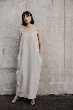 Linen Dress Motumo 18S11 Spring Linen Unlined Dresses, Spring Linen Dress Unlined, Unlined Linen Sundress Maxi Dress, Relaxed Fit Unlined Linen Dress, Linen Sundress With Relaxed Fit, Relaxed Fit Linen Sundress, Spring Linen Maxi Dress With Pockets, Beige Linen Dress With Pockets, Summer Dresses In Flax Color And Material