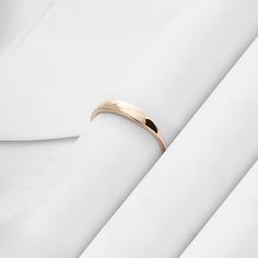 The Tiny Signet Ring is the pinnacle of minimalist design and elegant rings. Its plainness with glamorous modesty will fascinate people around you. It is perfect for everyday use and ring stacking. - Made in 14k Solid Gold - Band Width: 1.26 mm / 0.04 inches- Top Width: 3.30 mm / 0.12 inches- Thickness: 1.06 mm / 0.04 inches - This product comes with iconic Norm Jewels gift box Sleek Everyday Rings With Round Band, Sleek Everyday Rings, Elegant Couple Rings With Thick Band, Sleek Round Band Jewelry For Everyday, Sleek Everyday Round Band Jewelry, Minimalist Ring With Smooth Bezel And Thick Band, Elegant 14k Gold Stackable Rings With Thick Band, Minimalist Polished Couple Promise Rings, Elegant Everyday Toe Ring Stackable Rings