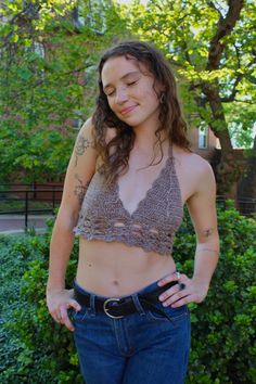 Crochet brown bralette with a tie back and tie neck. Fitted Brown Triangle Halter Top, Brown Fitted Triangle Halter Top, Beach Lace Crop Top Bra Friendly, Beach-ready Bra-friendly Lace Crop Top, Beach Lace Crop Top, Bra Friendly, Beach Crop Top In Lace That Is Bra Friendly, Festival Brown Crochet Lace Top, Festival Halter Neck Crop Top Bra Friendly, Festival Halter Neck Top, Bra Friendly