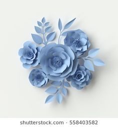 blue paper flowers are arranged on a white surface