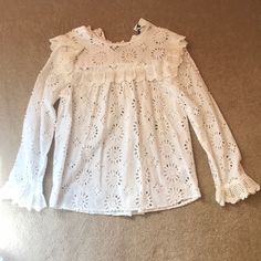 This Is A 100% Cotton Blouse That Is Embroidered With Floral And Geometric Designs. It Is Nwt From Zara In Size Xs. Lovely Off-White With Bib Design, Flared Cuffs, Buttoned In The Back At Top Of Blouse. It Is Supposed To Look “Unfinished” At The Hem, But A Great Boho Piece That I Never Got Around To Wearing, Sadly. Comes With Extra Button! Chic Long Sleeve Tops With Broderie Anglaise, Feminine White Tops For Fall, White Lace Top Blouse For Fall, Long Sleeve Tops With Broderie Anglaise For Spring, Spring Broderie Anglaise Top For Brunch, Chic Broderie Anglaise Tops For Spring, Broderie Anglaise Long Sleeve Top For Spring, Broderie Anglaise Top For Spring Brunch, White Long Sleeve Tops For Spring