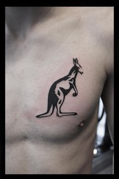 a man with a kangaroo tattoo on his chest