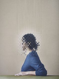 a woman is sitting at a table with her head in the middle of an image