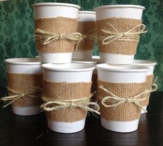 coffee cups wrapped in burlock and tied with twine