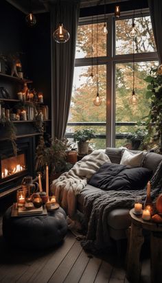 a living room filled with lots of furniture next to a large window covered in candles